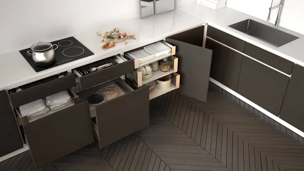 Modern kitchen top view, opened wooden drawers with accessories