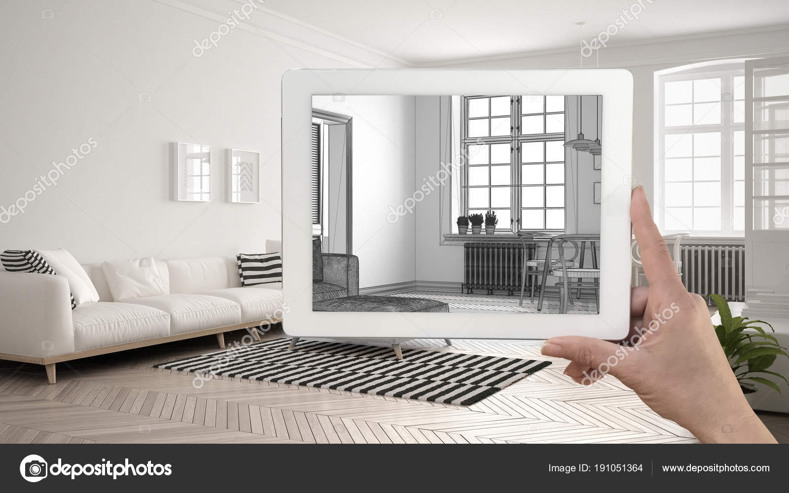 Hand Holding Tablet Showing Living Room Sketch Or Drawing