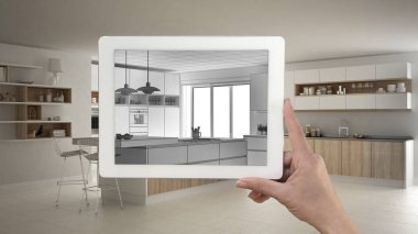 Tablet gösteren mutfak kroki tutarak veya çizim el. Gerçek fini