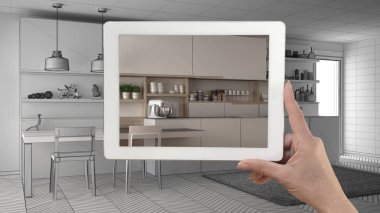 Gerçek gösterilen tablet tutan el minimalist beyaz bitirip w