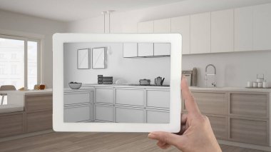 Tablet gösteren modern mutfak kroki tutarak veya çizim el. Re
