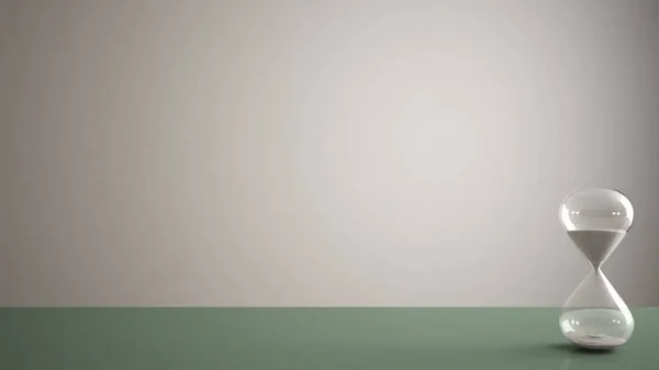 Mesa de pantone verde, mesa ou prateleira com ampulheta de cristal moderno medindo o tempo de passagem em uma contagem regressiva para um prazo, fundo espaço de cópia branca — Fotografia de Stock