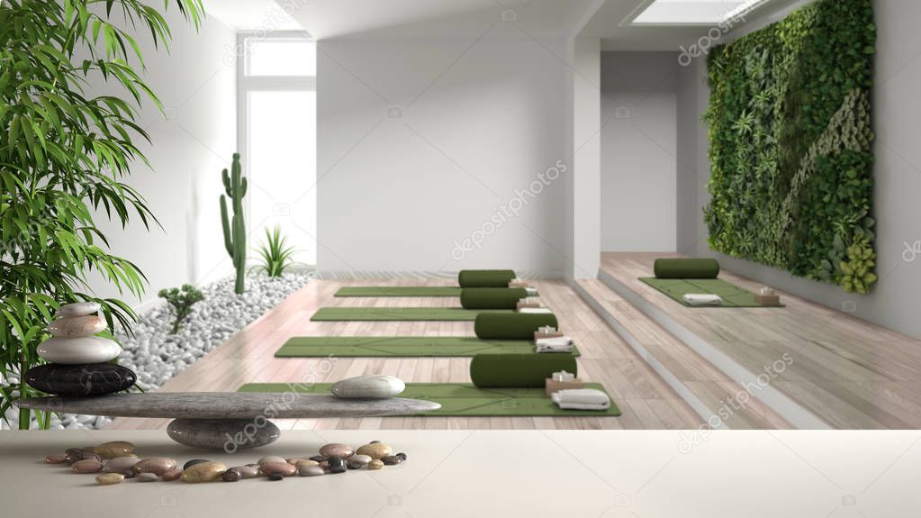 White table shelf with pebble balance and 3d letters making the word feng shui over yoga studio, vertical garden, ready for yoga practice, meditation room, zen concept interior design
