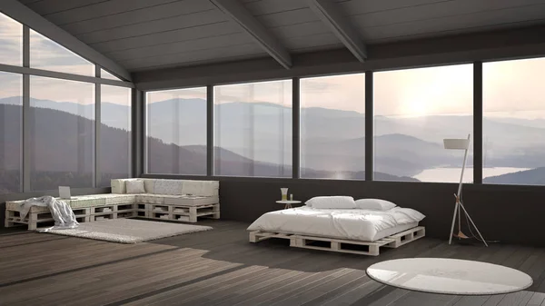 Duża panoramiczna sypialnia z oknami na dolinę górską, łóżko z palety, drewniana sofa z poduszkami, dywan, skandynawska lampa podłogowa, nowoczesny wystrój wnętrz architektury — Zdjęcie stockowe