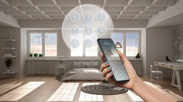 Smart home technology interface on phone app, augmented reality, internet of things, interior design of modern kitchen with connected objects, woman hand holding remote control device