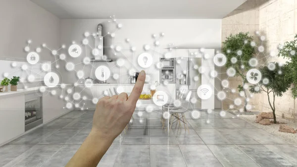 Glowing smart home interface, geometric background, connected line and dots showing internet of things system, hand pointing icons over kitchen interior, home automation concept