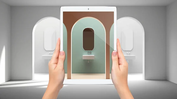 Hands holding tablet showing creative bathroom, archways, total blank project background, augmented reality concept, application to simulate furniture and interior design products