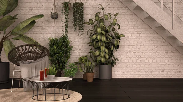 Rustic lounge with rattan armchair and coffee table, parquet floor, iron metal staircase. Brick walls, white and gray industrial interior design. Relax space full of potted plants