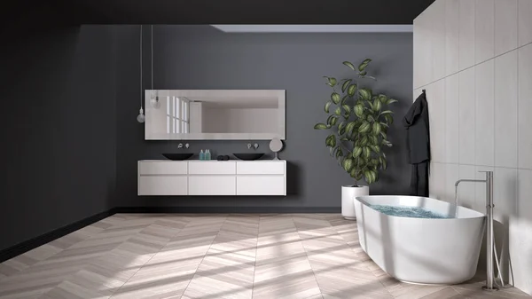 Ampio bagno nei toni del bianco e grigio con pavimento in parquet a spina di pesce, primo piano, vasca autoportante, doppio lavabo, asciugamani e bottiglie, specchio, pianta in vaso, design degli interni minimalista — Foto Stock