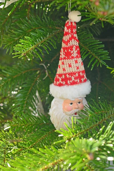 Ceramic Christmas toy Santa Claus on the Christmas tree — Stock Photo, Image