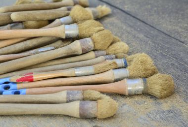 Many brushes for archaeological excavations clipart
