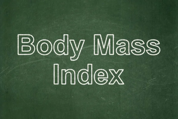 Концепция медицины: Индекс массы тела на фоне доски — стоковое фото
