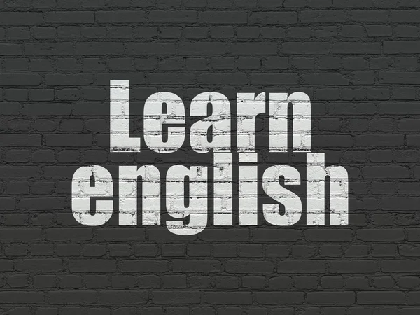 Conceito de aprendizagem: Aprenda inglês no fundo da parede — Fotografia de Stock