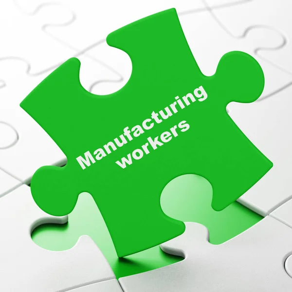 Concept van de industrie: productie werknemers op puzzel achtergrond — Stockfoto