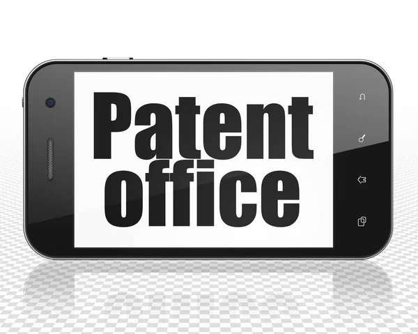法律概念︰ 智能手机与专利局展出 — 图库照片