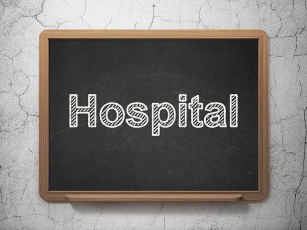Conceito de medicina: Hospital em fundo quadro-negro — Fotografia de Stock
