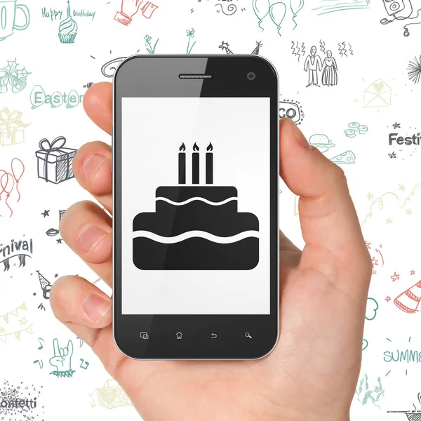 Entertainment, concept: Hand Holding Smartphone met Cake op display — Stockfoto