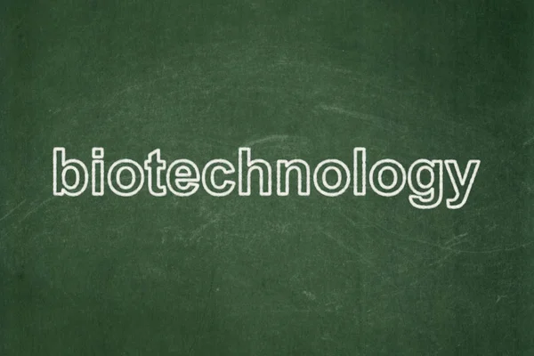 Concepto científico: Biotecnología en el fondo de pizarra — Foto de Stock