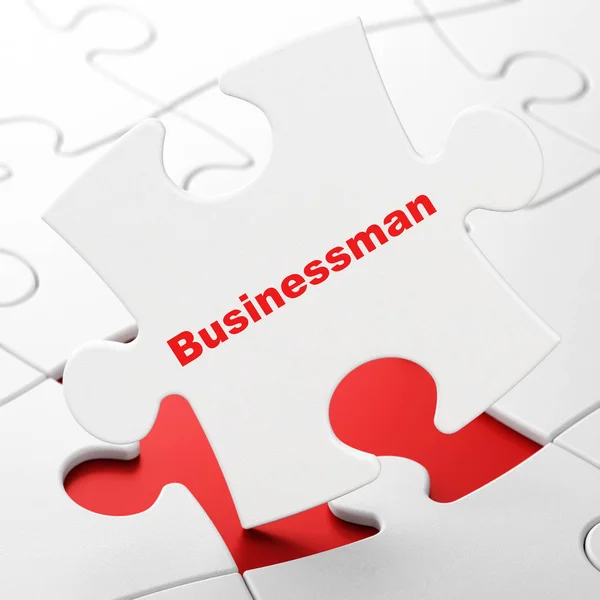 Obchodní koncept: podnikatel na pozadí puzzle — Stock fotografie