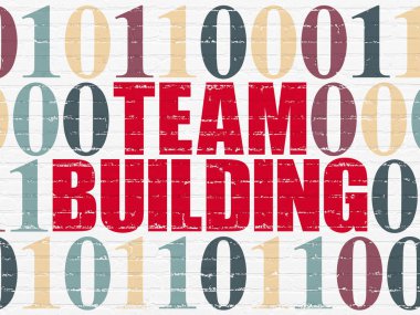 İş kavramı: duvar arka plan üzerinde ekip oluşturma