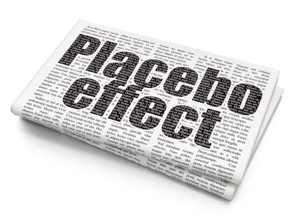 Концепція охорони здоров'я: ефект плацебо на тлі газети — стокове фото