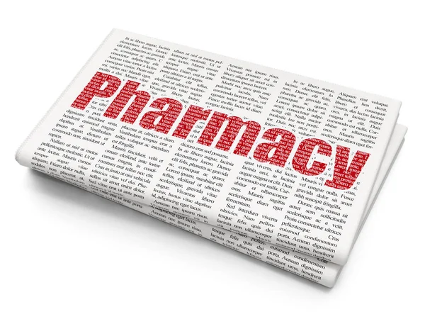 Koncepce zdraví: lékárna na pozadí noviny — Stock fotografie