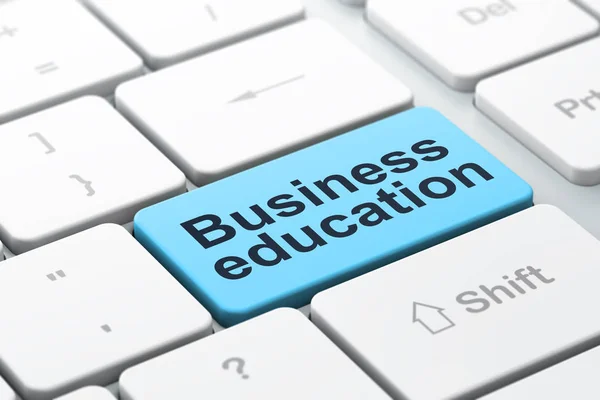 Концепция обучения: бизнес-образование на фоне компьютерной клавиатуры — стоковое фото