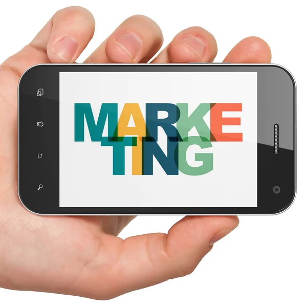 Concepto de marketing: Smartphone de mano con marketing en pantalla —  Fotos de Stock