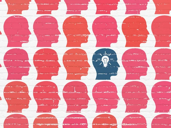Finance concept: head with light bulb icon on wall background — Stock Photo, Image