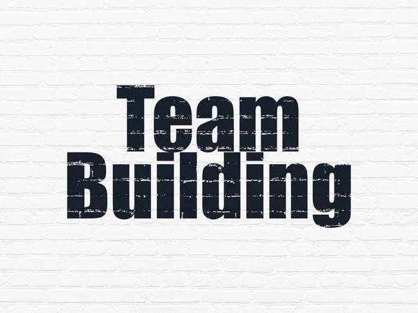 Finanční koncept: Team Building na zeď na pozadí — Stock fotografie