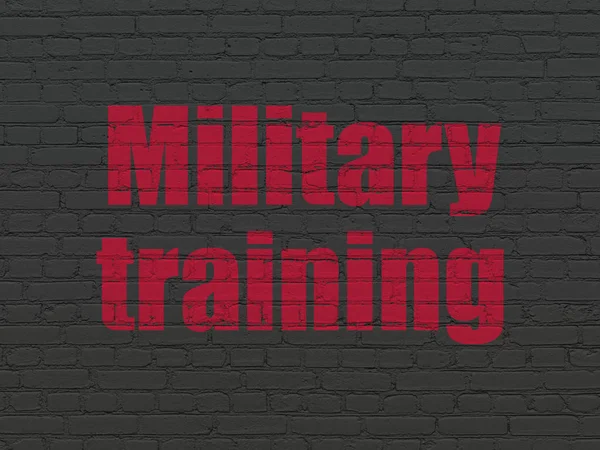 Læringskoncept: Militær træning på vægbaggrund - Stock-foto