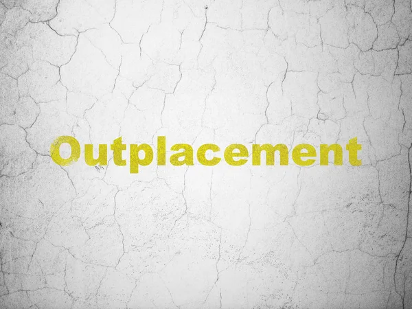 Obchodní koncept: Outplacement na zeď na pozadí — Stock fotografie