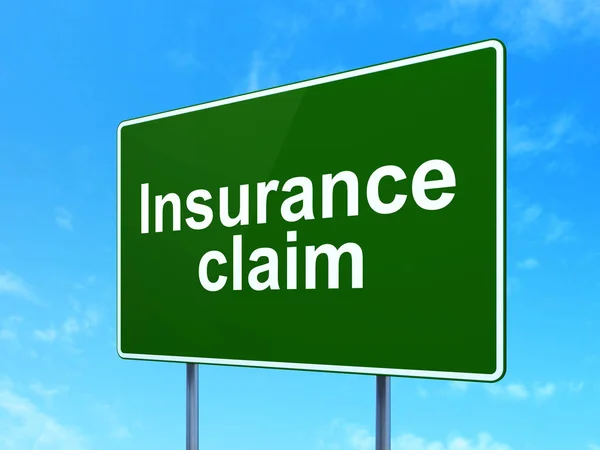 Insurance concept: Insurance Claim on road sign background