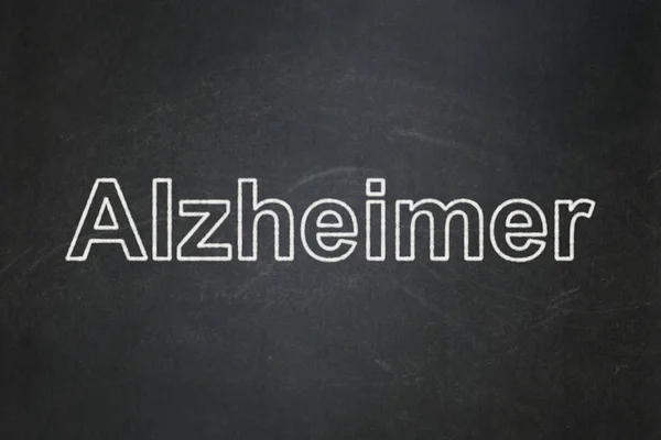 Sağlık kavramı: Alzheimer kara tahta arka plan üzerinde — Stok fotoğraf
