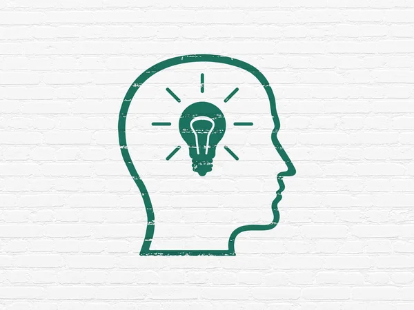 Information concept: Head With Lightbulb on wall background — Stock Photo, Image