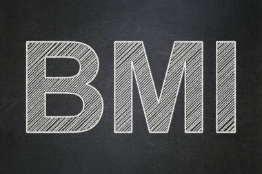 Sağlık kavramı: BMI kara tahta arka plan üzerinde