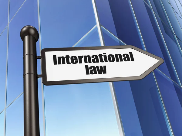 Politics concept: sign International Law on Building background — Stock Photo, Image