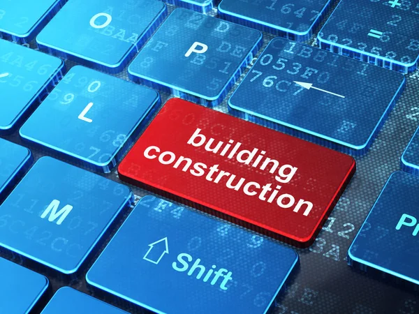 Concepto de construcción del edificio: Construcción del edificio en el fondo del teclado del ordenador — Foto de Stock