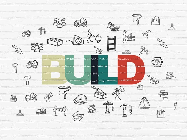 Constructing concept: Build on wall background — Stock Photo, Image