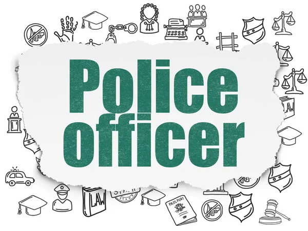 Закон концепція: офіцер поліції на фоні Torn паперу — стокове фото