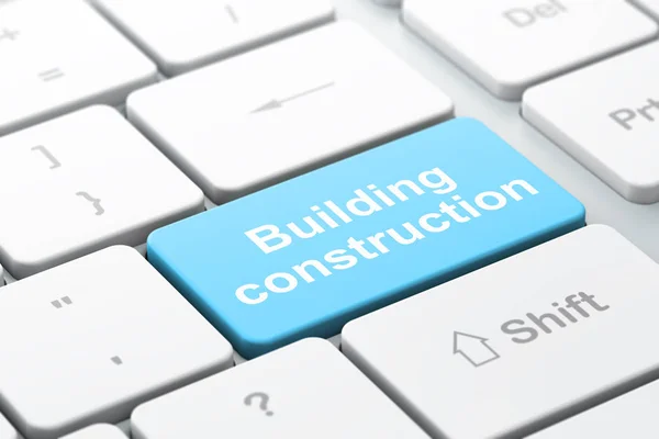 Концепция строительства здания: строительство зданий на фоне компьютерной клавиатуры — стоковое фото