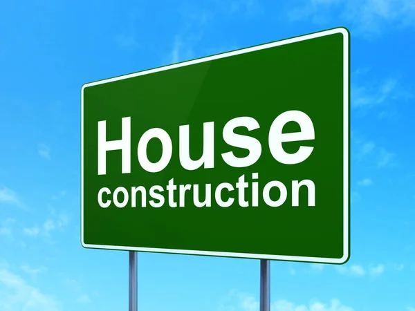 Constructing concept: House Construction on road sign background — Stock Photo, Image