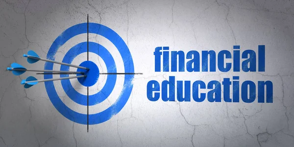 Концепція навчання: ціль та фінансова освіта на тлі стіни — стокове фото