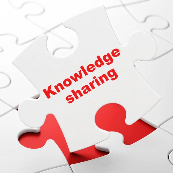 Lärande koncept: Knowledge Sharing på pussel bakgrund — Stockfoto