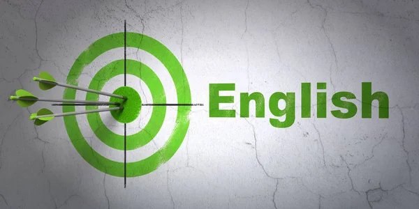 Studying concept: target and English on wall background — Stock Photo, Image