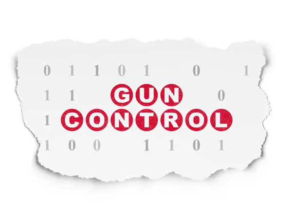 Safety concept: Gun Control on Torn Paper background