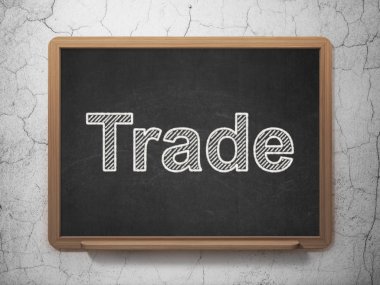Ekonomi kavramı: Kara tahta arka plan üzerinde ticaret