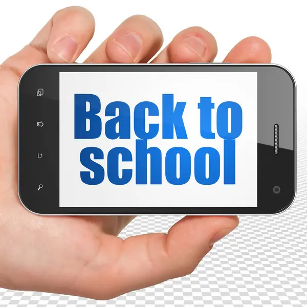 Learning concept: Hand Holding Smartphone with Back to School on display — Stock Photo, Image