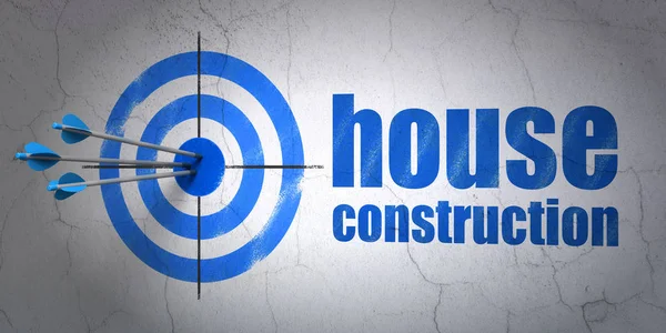 Koncepcja budowy: miejsce docelowe i budowy domu na tle ściany — Zdjęcie stockowe