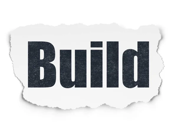 Concepto de construcción: Construir sobre un fondo de papel roto — Foto de Stock
